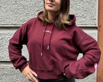 Disclaimer – Maglia donna crop con cappuccio in felpa